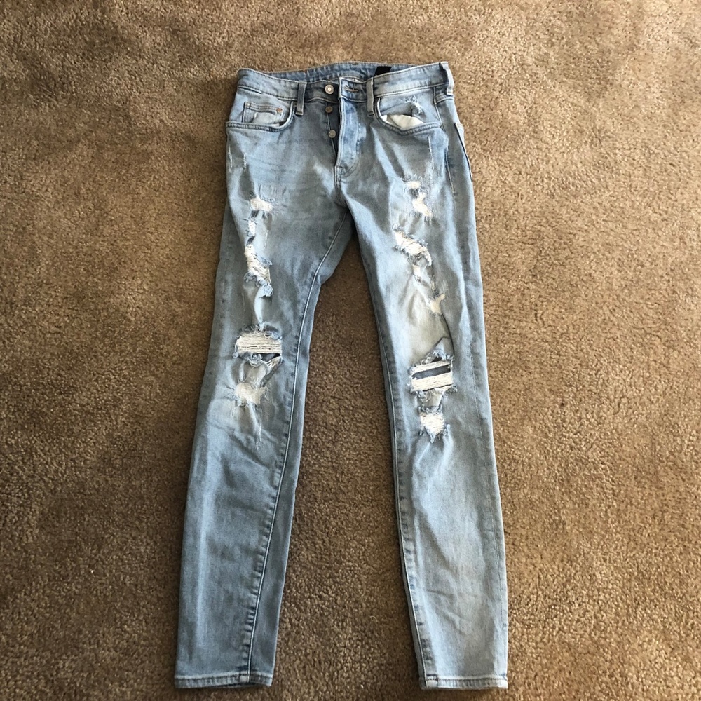 Light Washed Ripped Jeans - Picture 2 of 4